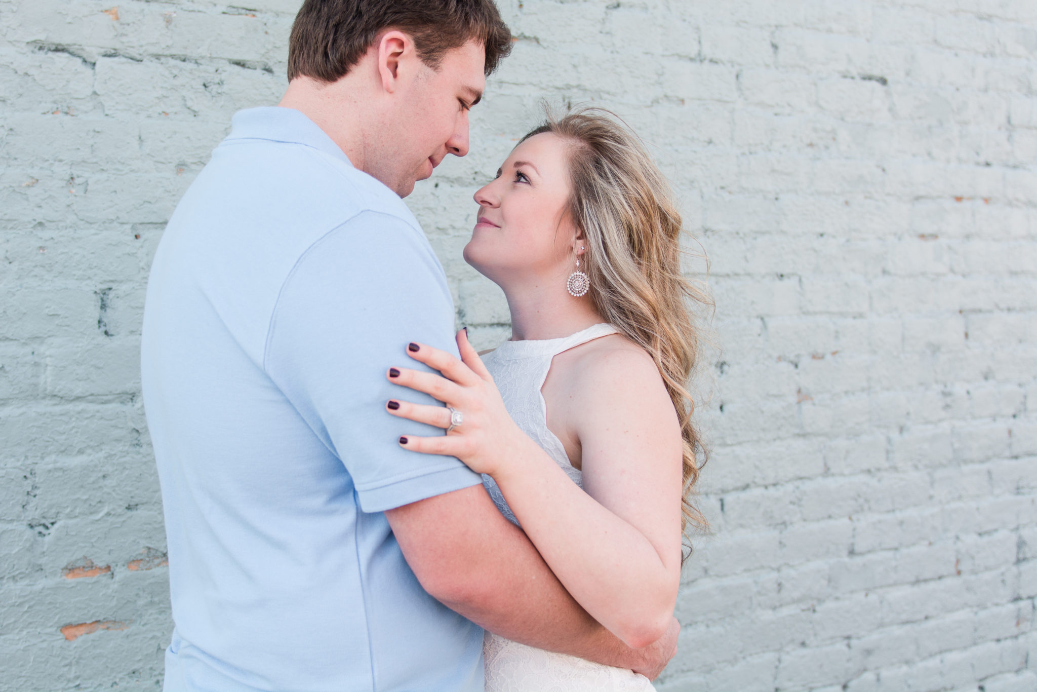 Downtown Woodruff, South Carolina Engagement Photography with mint wall