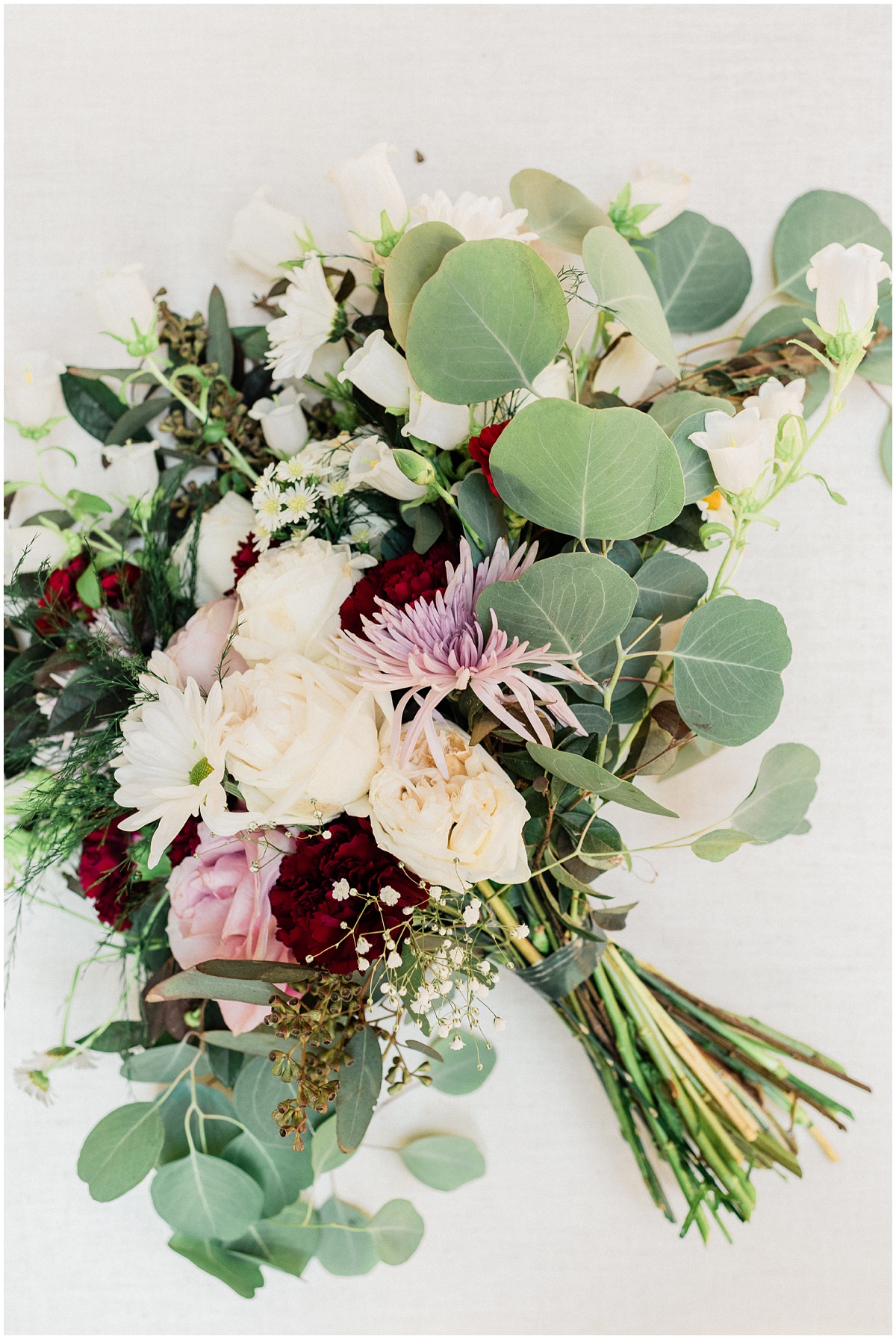 Bridal bouquet with maroon, dusty rose and eucalyptus