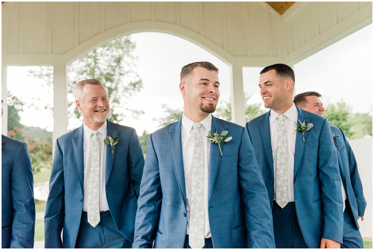 Groom and Groomsmen with floral tie details