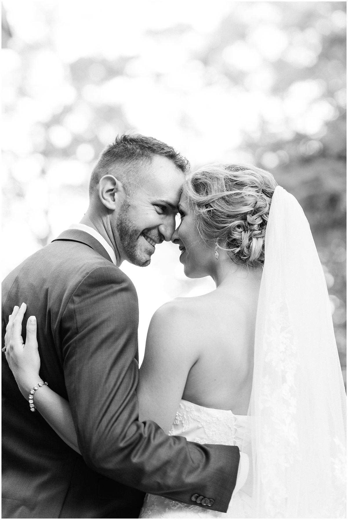 Black and white bride and groom close up