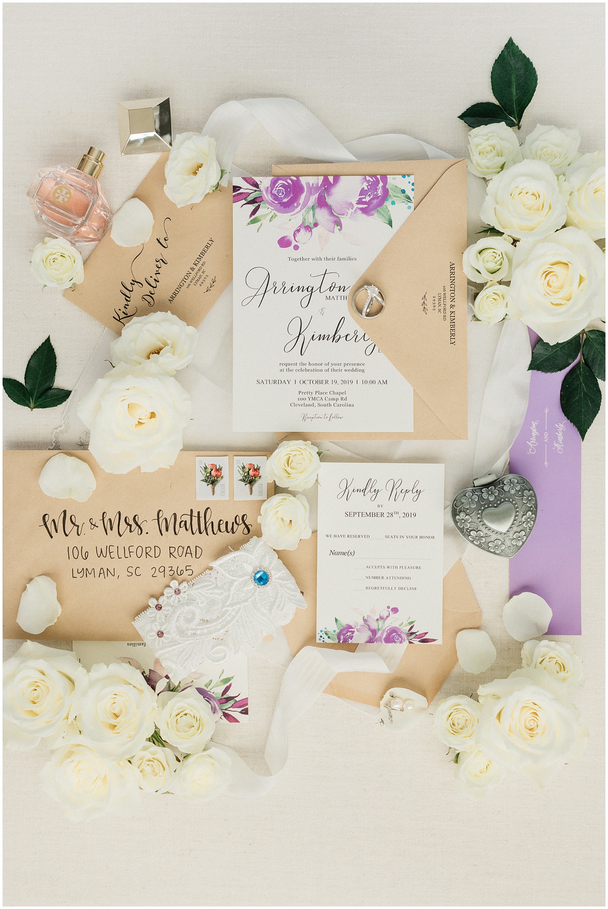 Purple wedding invitation flat lay