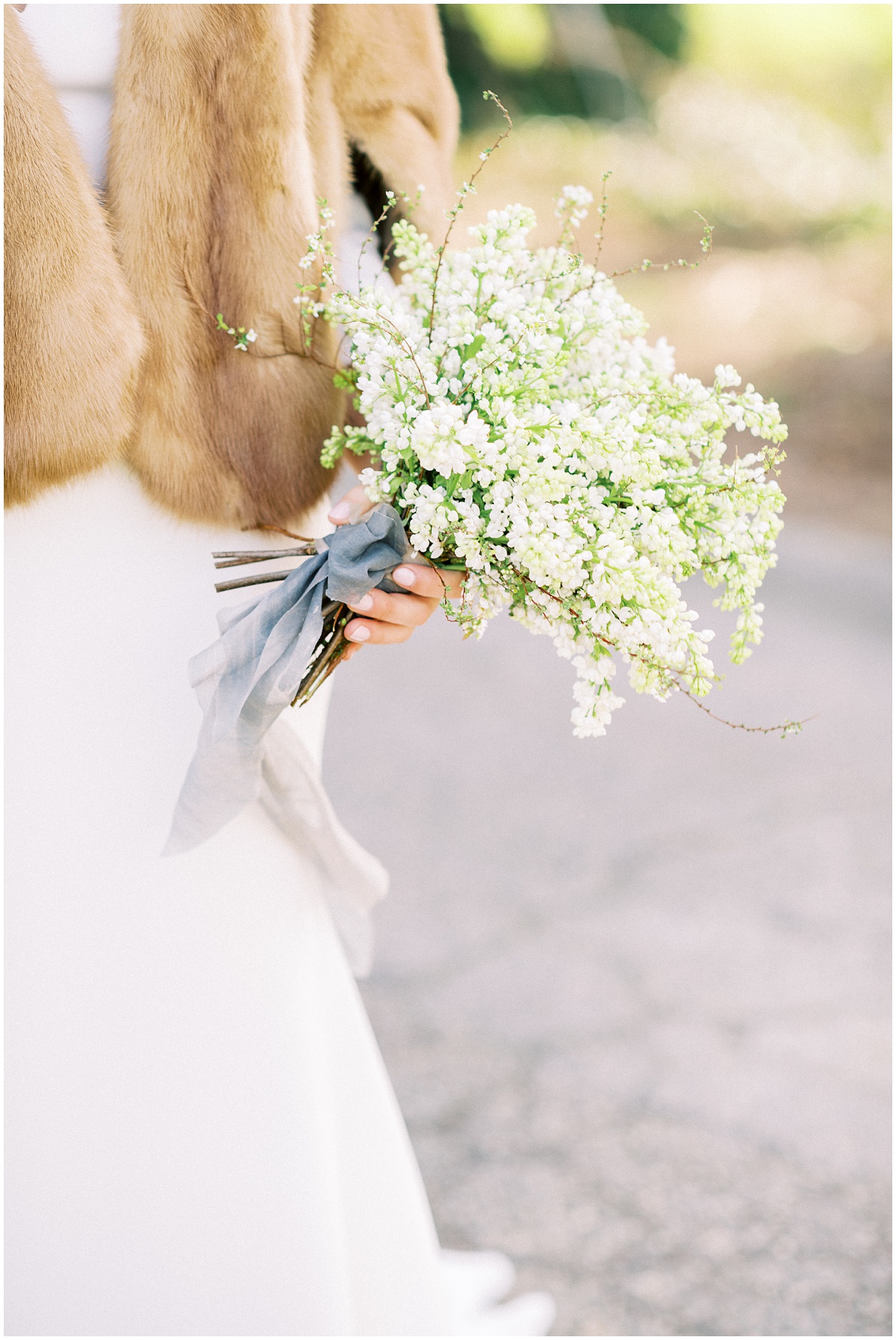 White lilac bridal bouquet winter wedding