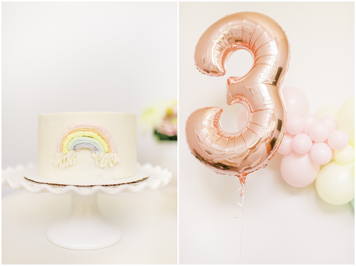 Rainbow birthday cake and rose gold number 3 balloon