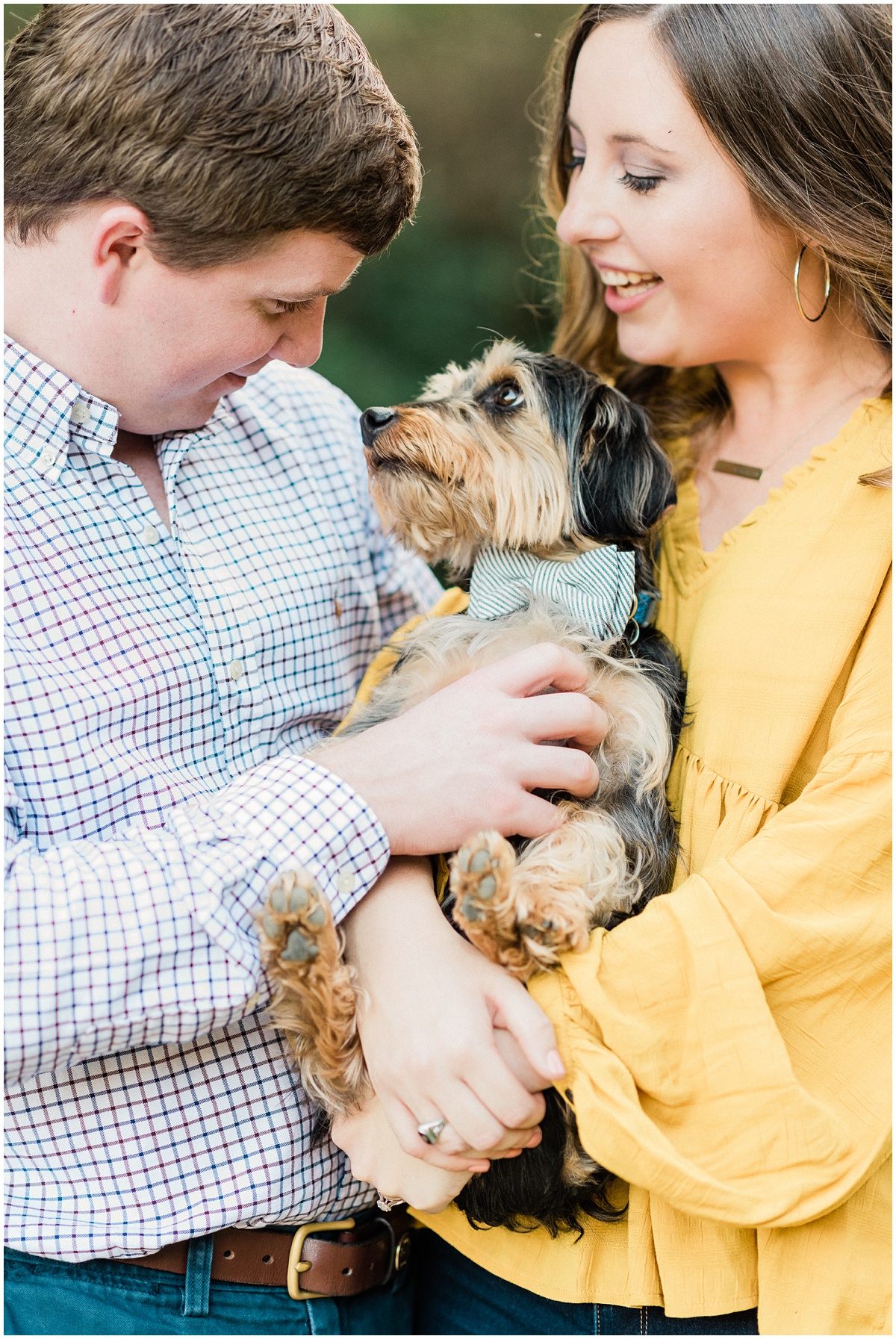 Engagement photo with dog and bow tie